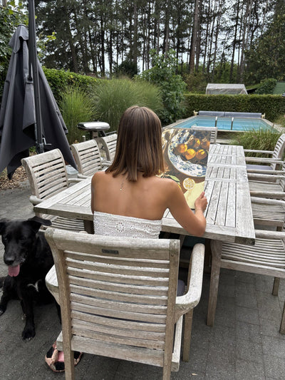 Painting outdoors on a terrace by the pool