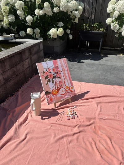 A finished paint by numbers canvas outdoors