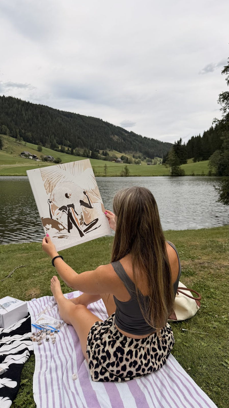 Painting beside a lake